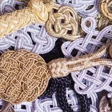 A gombkötő mester borítóképe